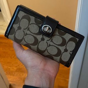 Brown Coach wallet. Used once or twice.
